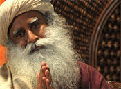 What does Sadhguru see in the mirror?